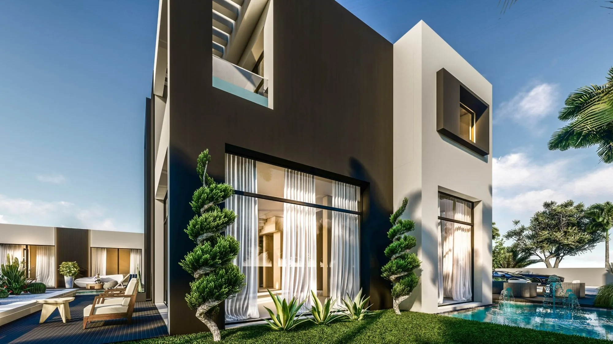 Corner of a two-storey villa, tall curtained windows and pool
